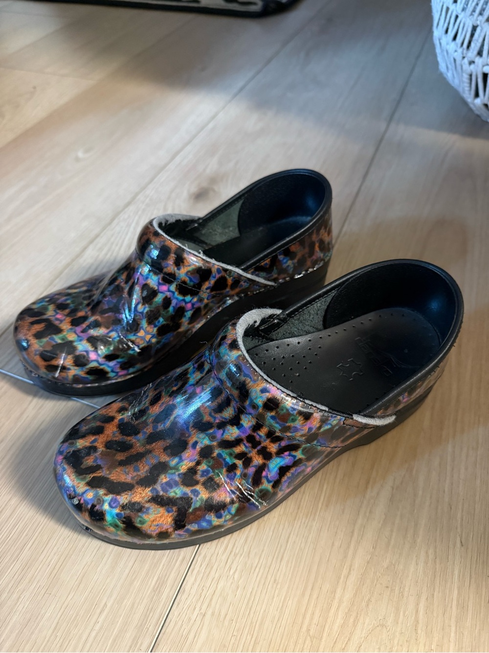 Dansko Leopard Print Iridescent Clogs in Brown and Black